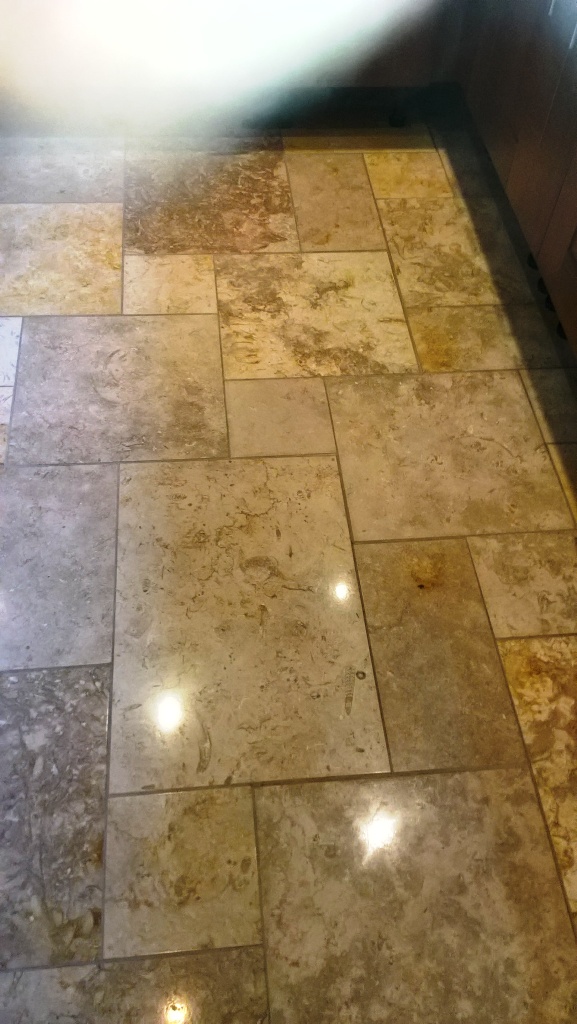 The limestone floor after cleaning, honing, and sealing